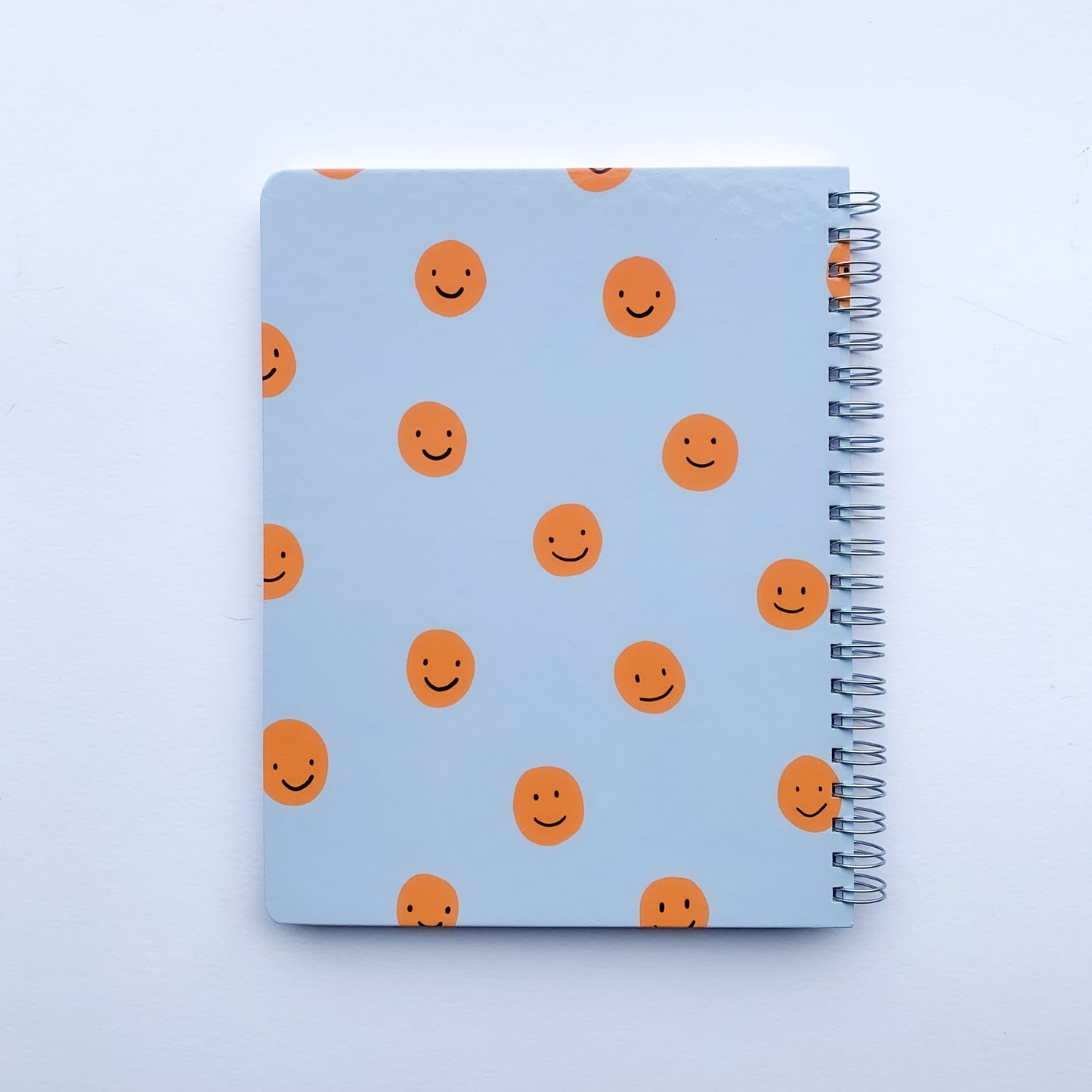 Contraportada cuaderno caritas grande