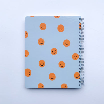 Contraportada cuaderno caritas grande